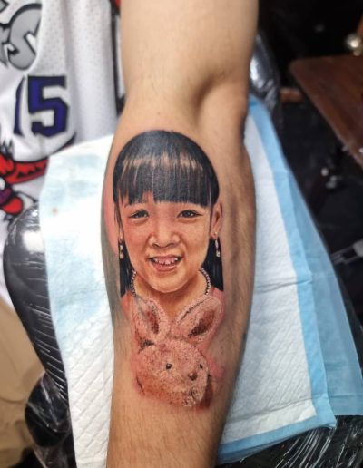 Cute lady tattoo on arm