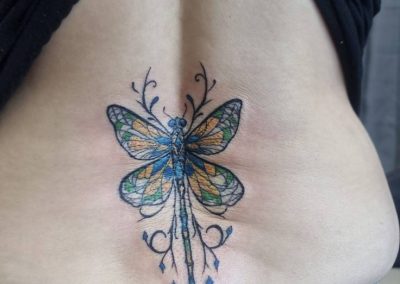 Butterfly tattoo symbolizing transformation and beauty