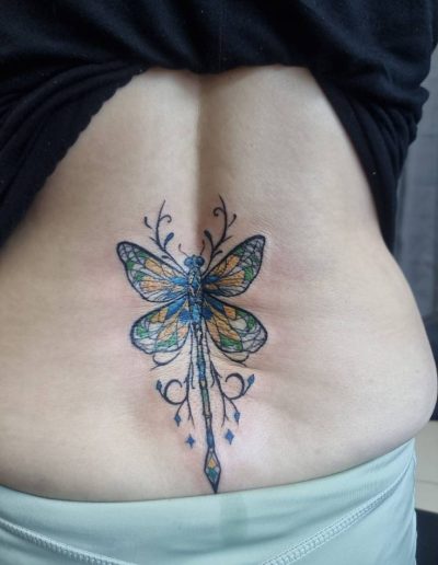 Butterfly tattoo symbolizing transformation and beauty