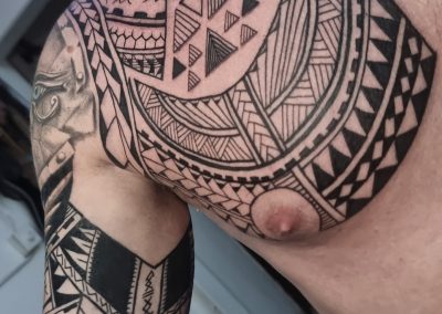 Mandala tattoo with intricate geometric patterns