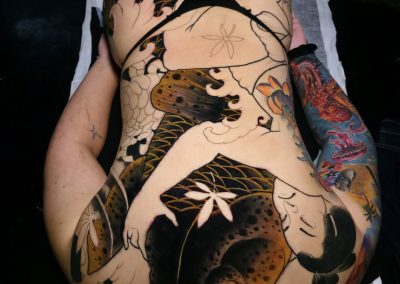 Japanese inspired tattoo with bright colors