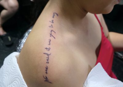Script name tattoo with elegant calligraphy